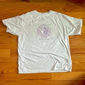 Large oversized sunflower shirt.